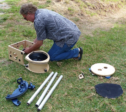 Eric dismantles his homemade telescope